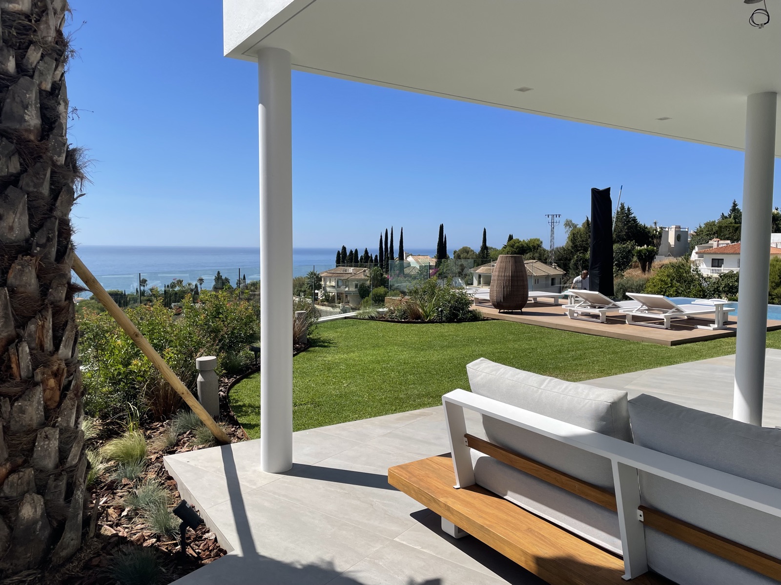 Luxury villa outdoor terrace and landscaped garden — Domus Eco Villas, Costa del Sol